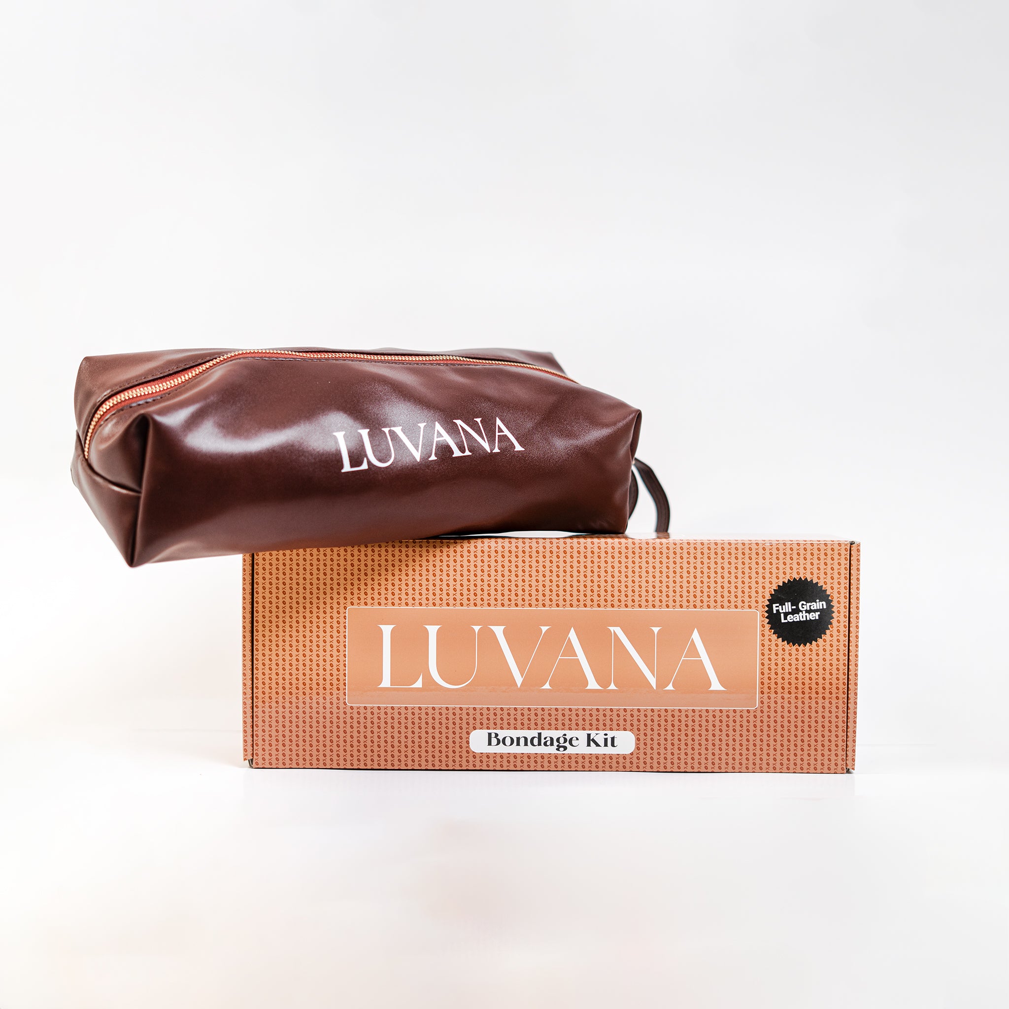 Discreet Luvana storage bag included with 11-piece maroon leather bondage kit