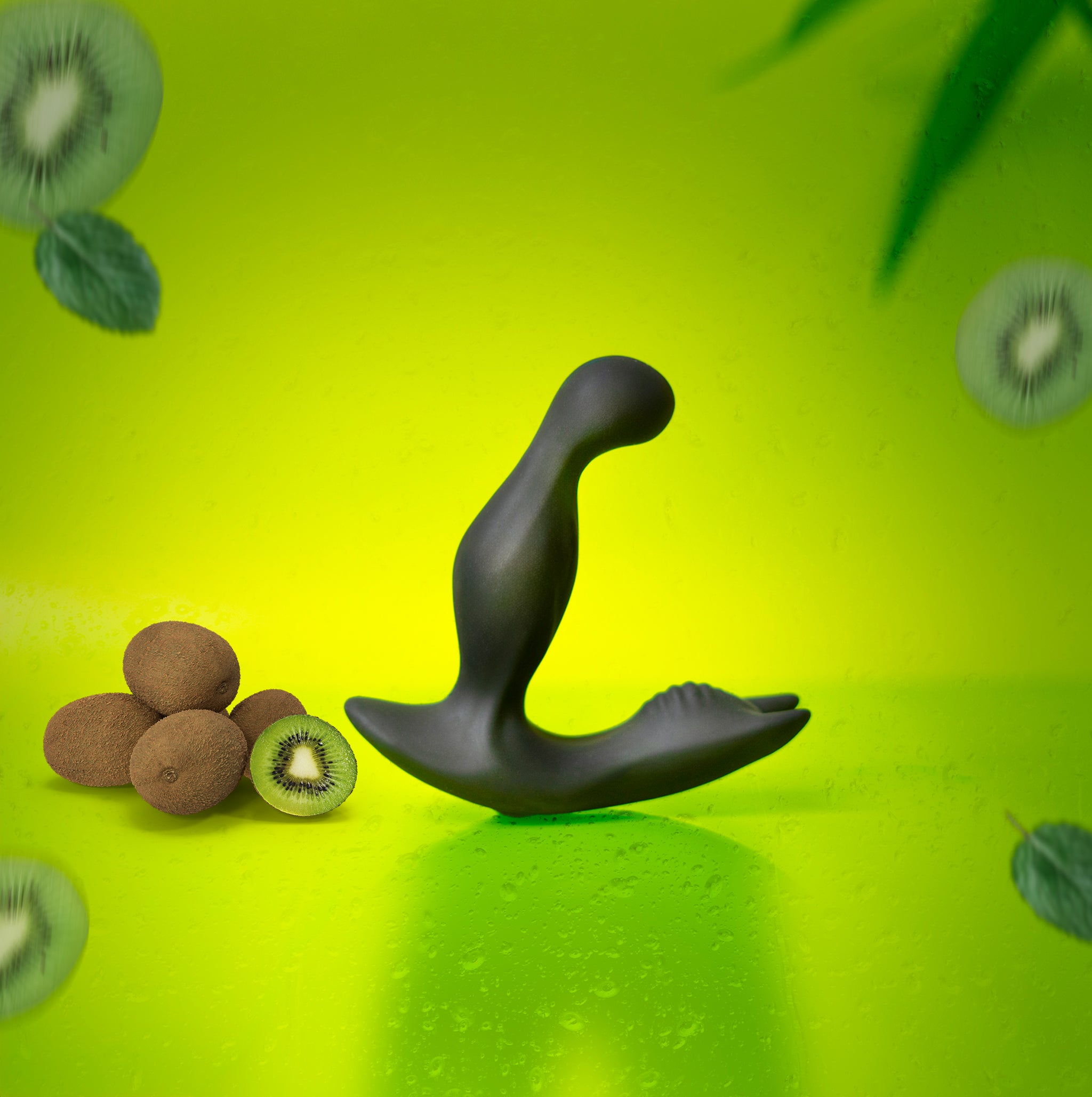 Luvana Knight Ryder vibrating prostate massager on neon green background with sliced kiwi.