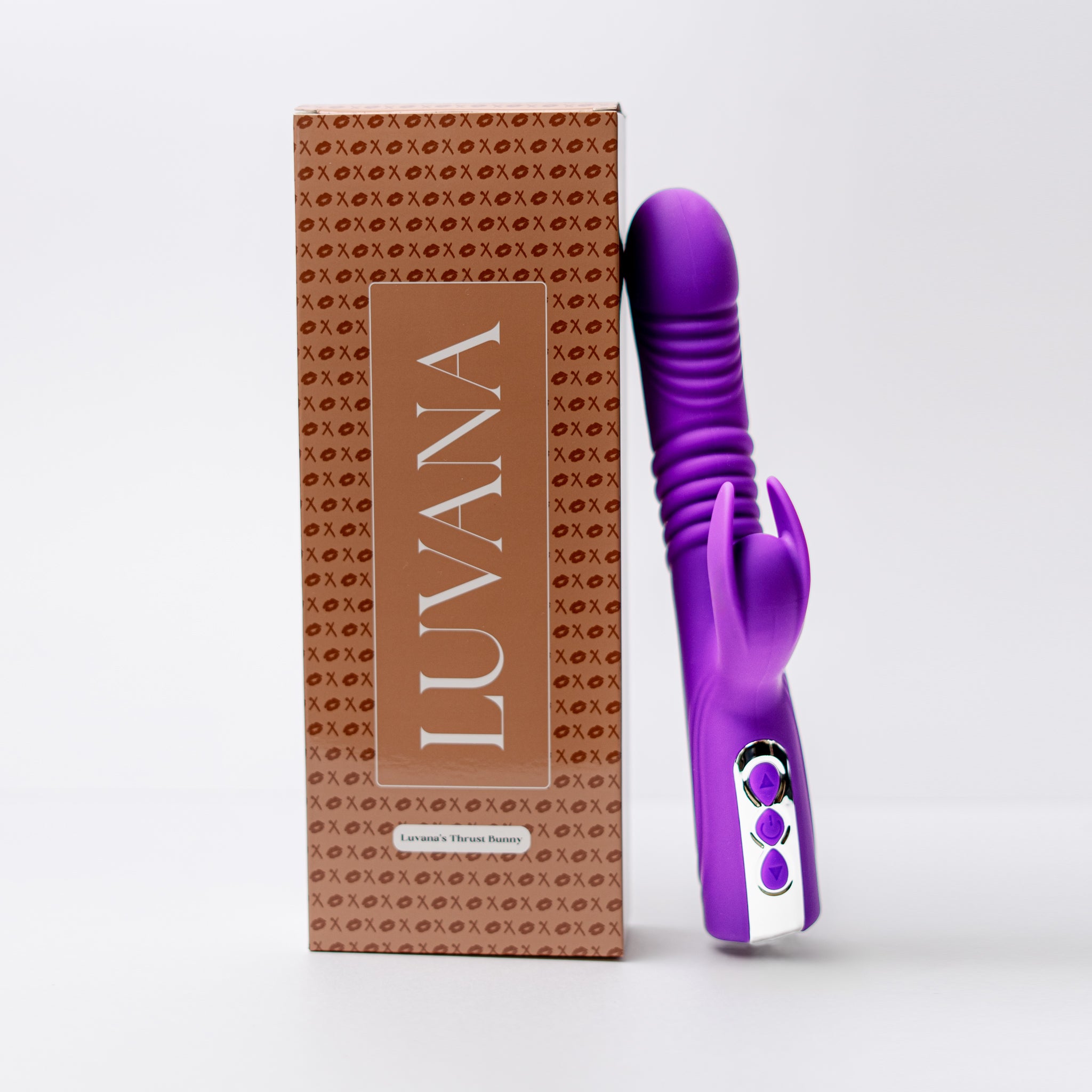 Luvana Thrust Bunny box next to purple thrusting rabbit vibrator, retail packaging and product display on white background