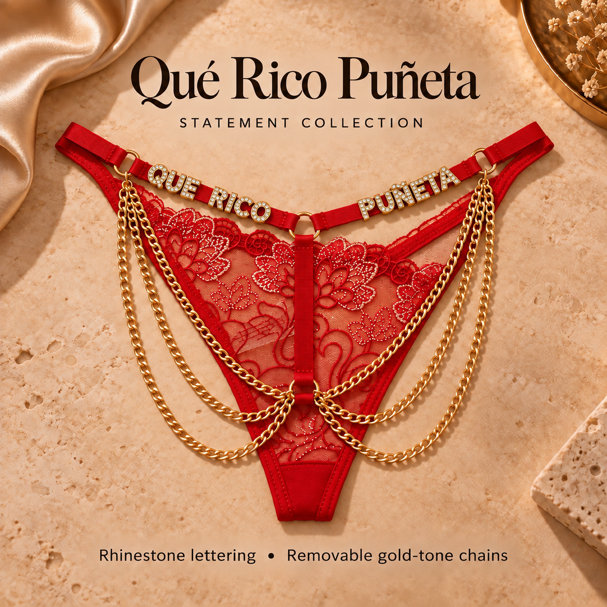Qué Rico Puñeta — red Statement Collection panties with rhinestone lettering and removable gold-tone chains