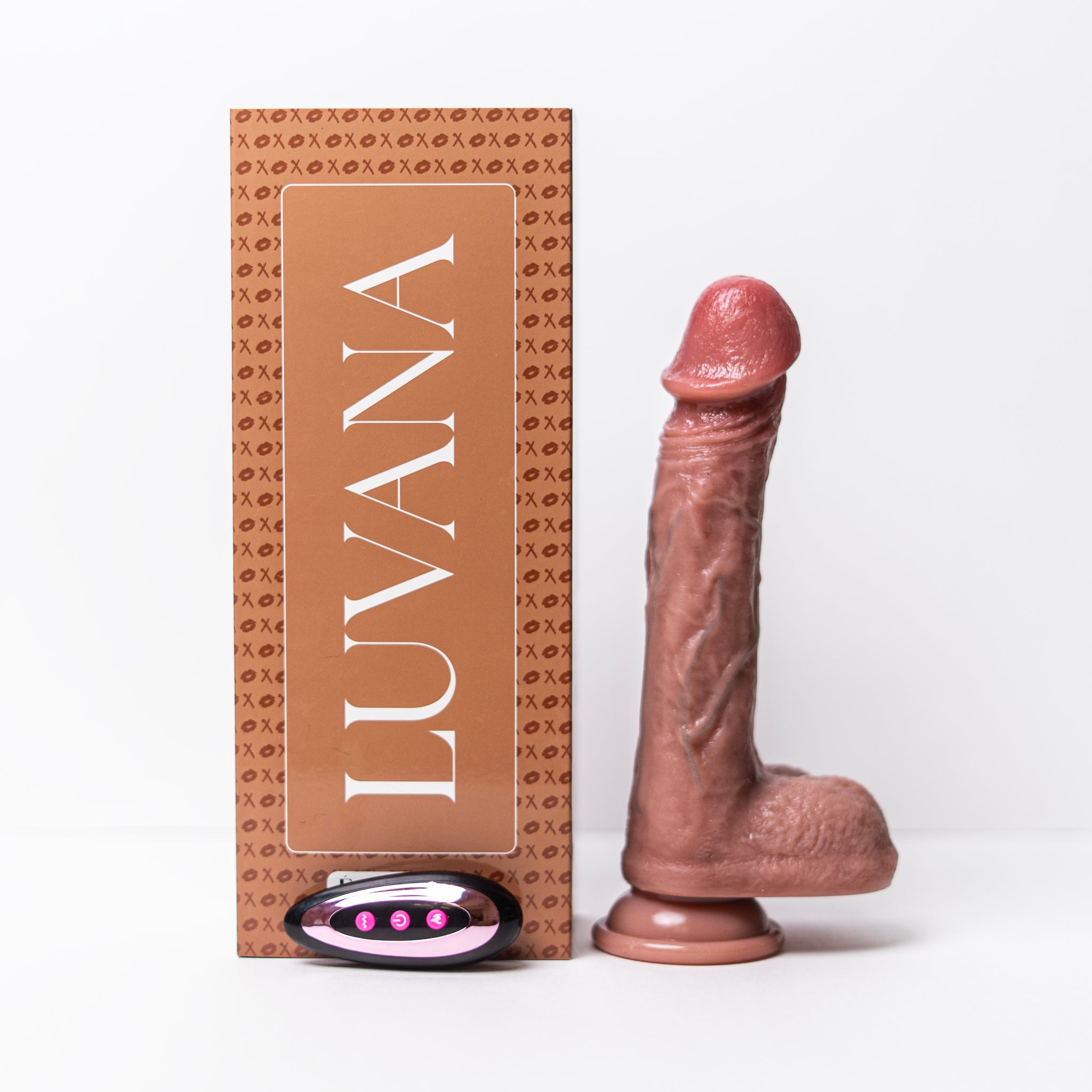 Flesh Thrill realistic thrusting vibrating dildo with remote control and Luvana box, shown upright with suction base.