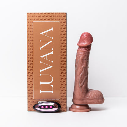 Flesh Thrill realistic thrusting vibrating dildo with remote control and Luvana box, shown upright with suction base.