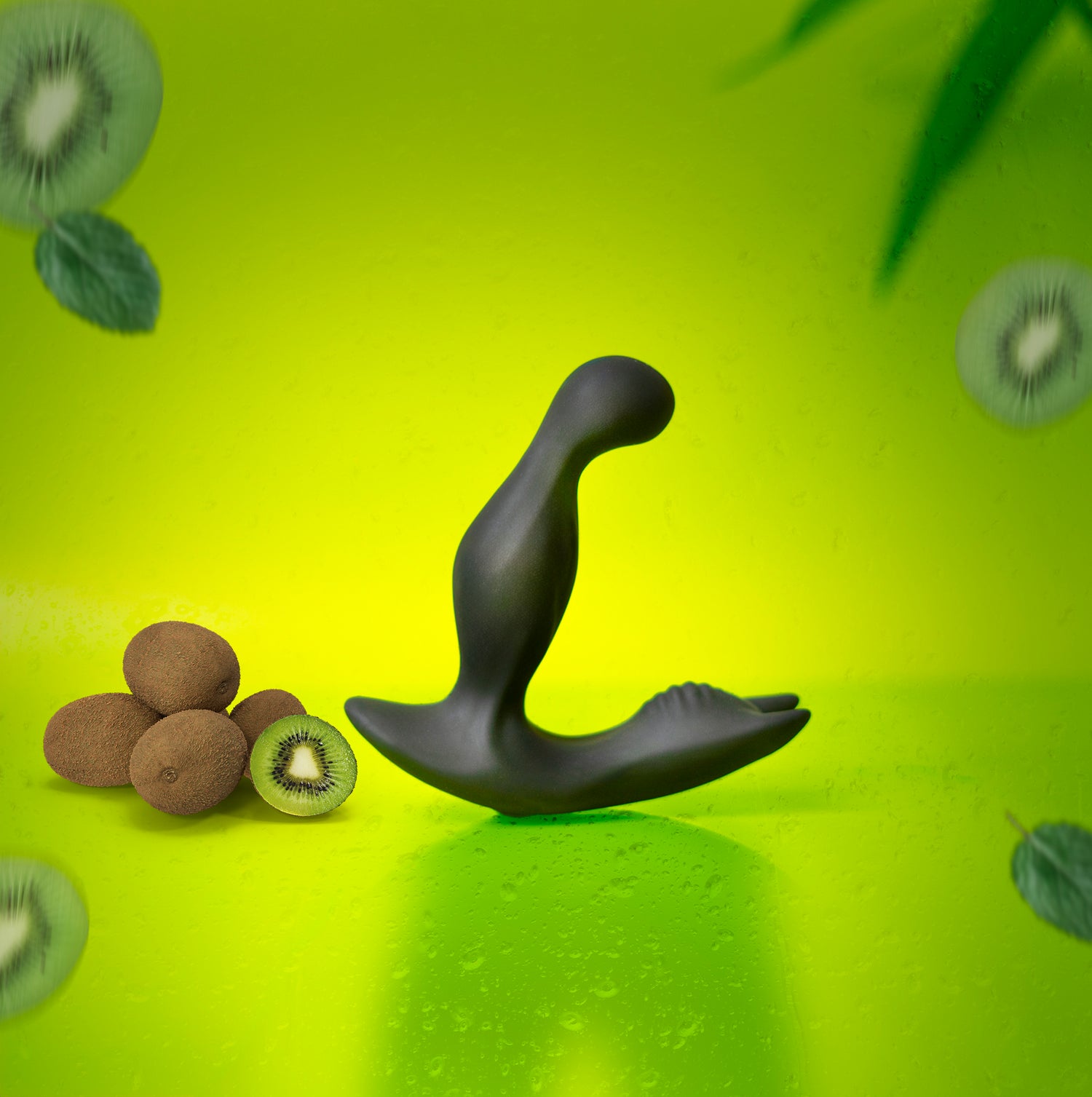 Luvana Knight Ryder vibrating prostate massager on neon green background with sliced kiwi.