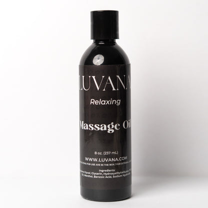 Luvana Lavender Massage Oil standing bottle on white background, vegan relaxing massage and body oil made in Puerto Rico.