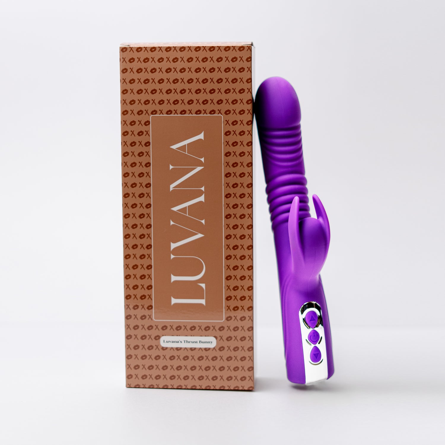 Luvana Thrust Bunny box next to purple thrusting rabbit vibrator, retail packaging and product display on white background