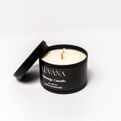 Open Luvana Massage Candle jar with lid beside it on white background, soy wax massage oil candle made in Puerto Rico.