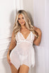 Close front view of Luvana Soft Halo white babydoll featuring floral lace cups and lightweight sheer mesh, by a curtain.