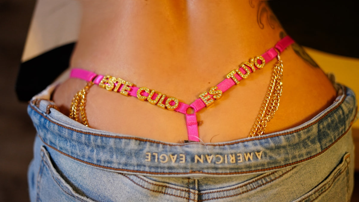 Luvana pink statement panties on model - back lettering